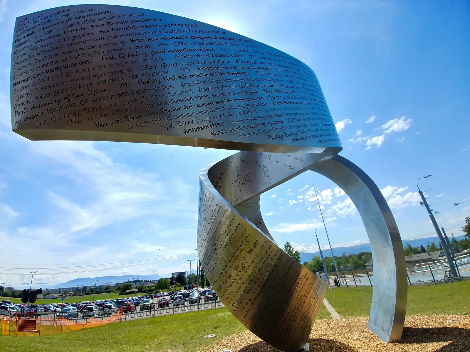The 'Wandering the Immeasurable' sculpture — the side engraved with scientists' names and discoveries.